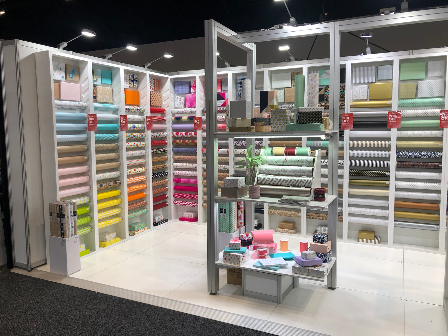 Bee Dee Bags displayed at a trade show, featuring a selection of products from our catalogue. This showcase highlights various styles and options available for review. Click here to view our full catalogue.